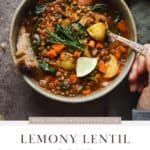 Lemony lentil soup with potatoes and fresh dill in a bowl.