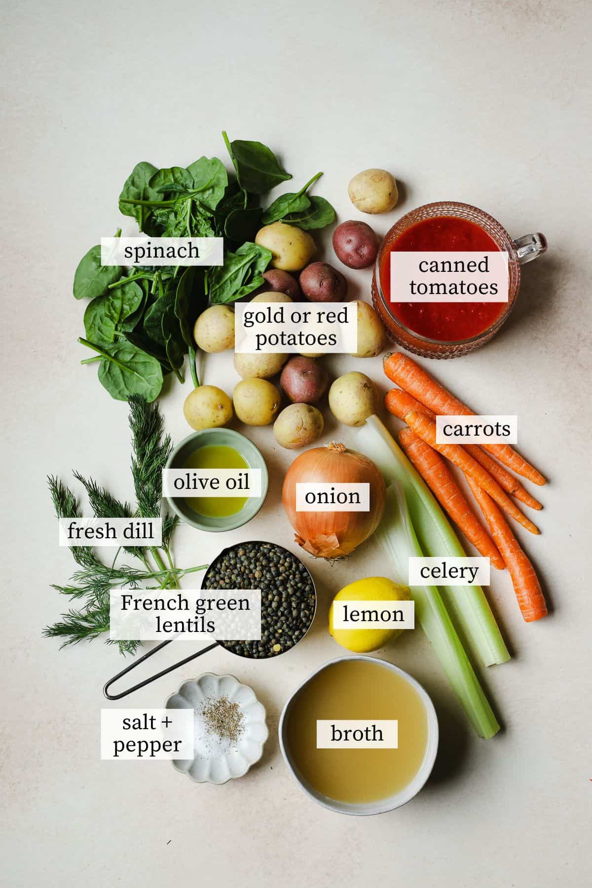Ingredients needed to make lentil soup with potatoes and dill.
